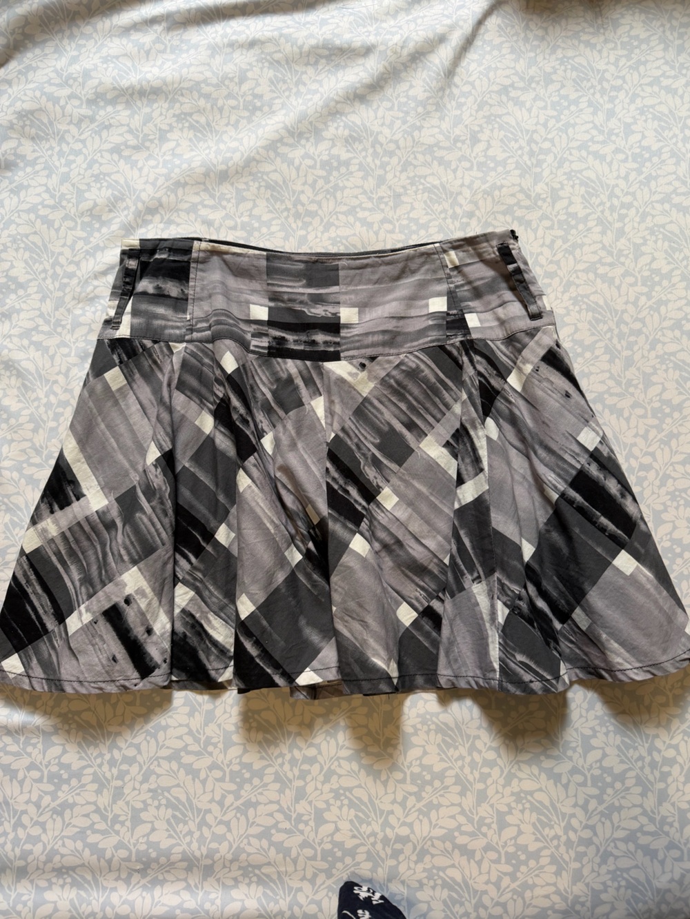 Delta’s Kiki Plaid Silk Mini Skirt